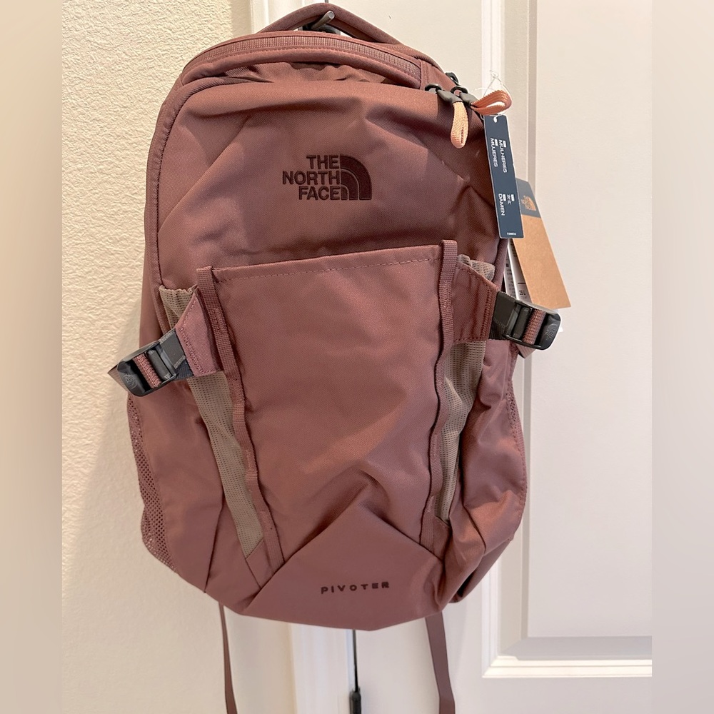 The North Face Pivoter adult backpack. Rare Pink clay. New with tags
